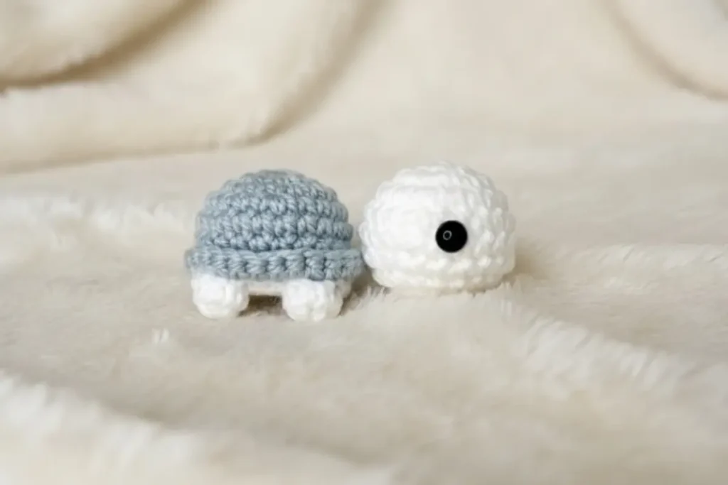 Mini Turtle Pocket Amigurumi Crochet Pattern finished turtle in hand