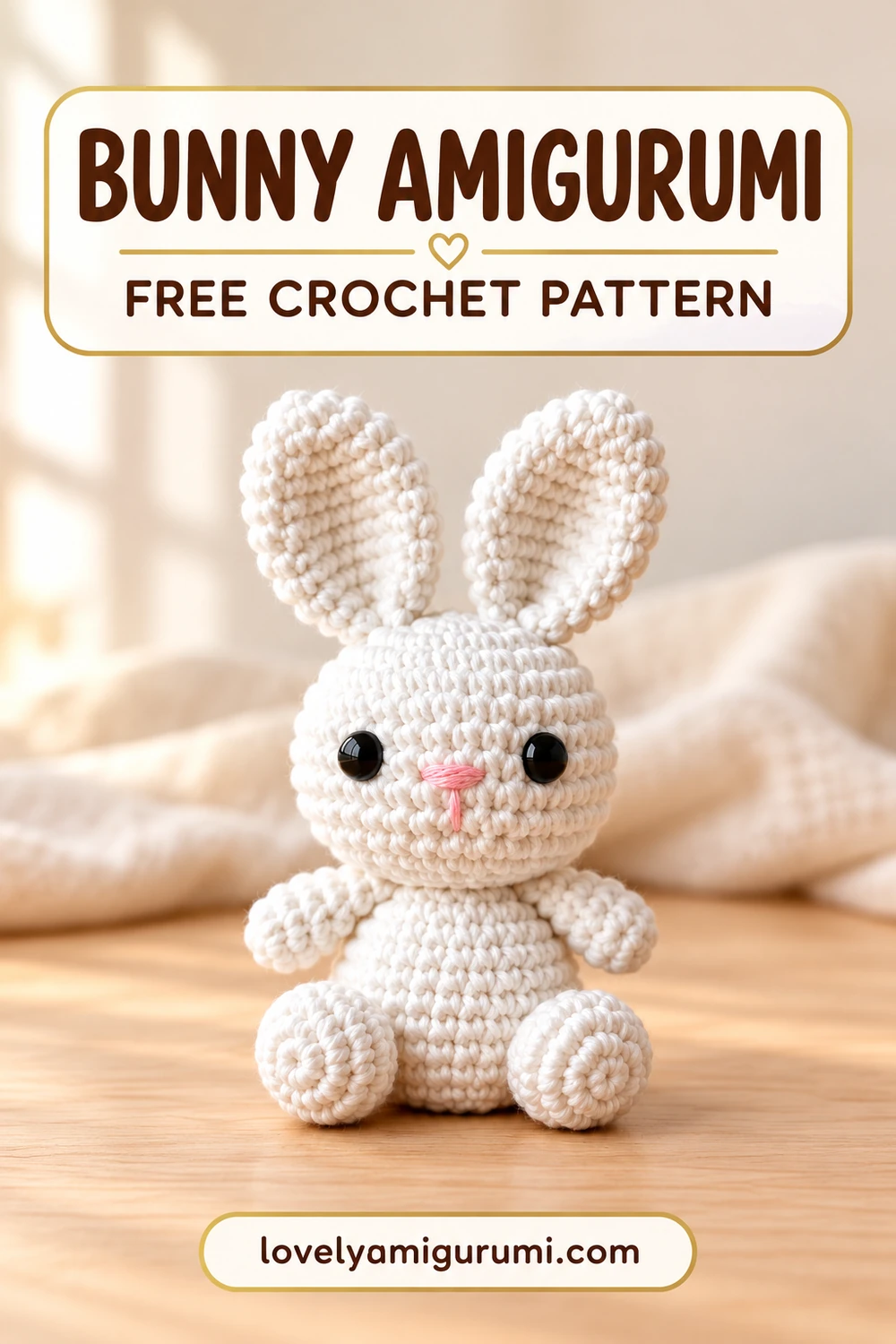 Bunny Amigurumi with white upright ears, round feet and a pink embroidered nose Pinterest pin 1
